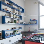 Children's study with wrap around floating shelving and storage units