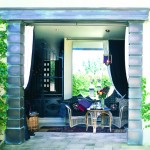 Outdoor sitting area with Entablature in Florentine Bronzed finish