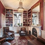 Custom made bookcases with decorative wall panelling